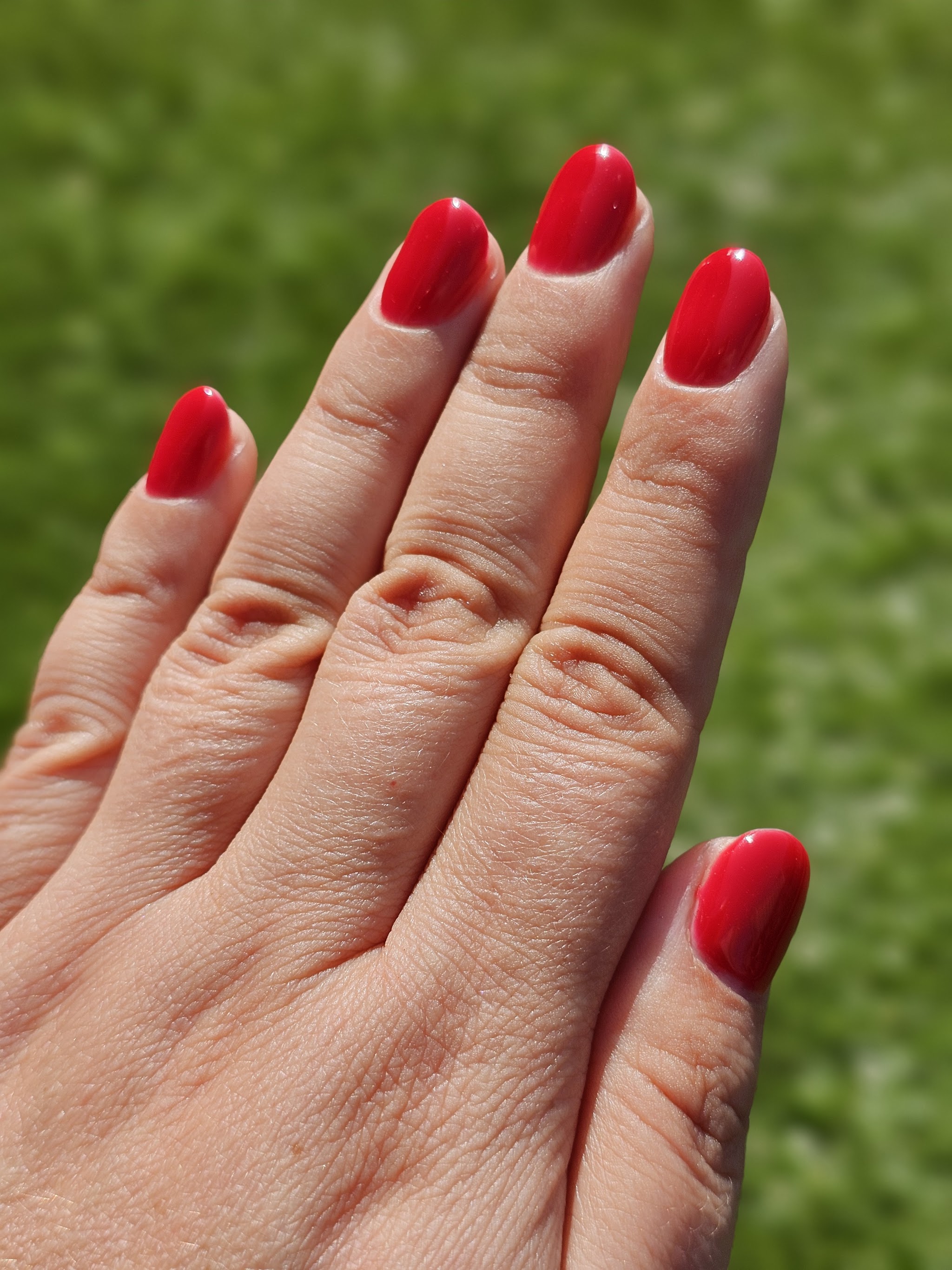 Glanzend rode nagels